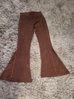 Rock & Roll Cowgirl brown top with black tag and pink logo